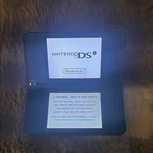 Nintendo DS XL Blue Handheld Console with Pokémon Pearl version